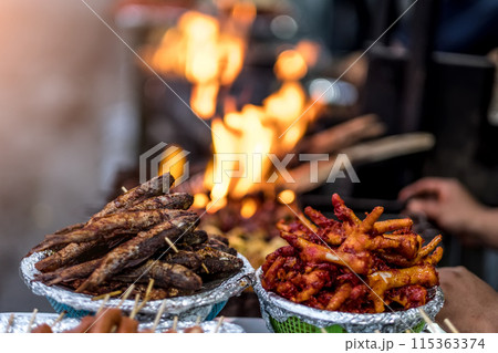 Fried Nepalese street food on market Fried Nepalese street food on market 115363374