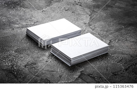 Stacks of white business cards Stacks of white business cards 115363476