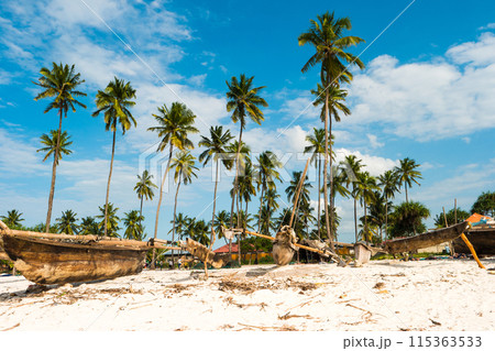 wooden sailing and fishing boat sitting ashore wooden sailing and fishing boat sitting ashore 115363533