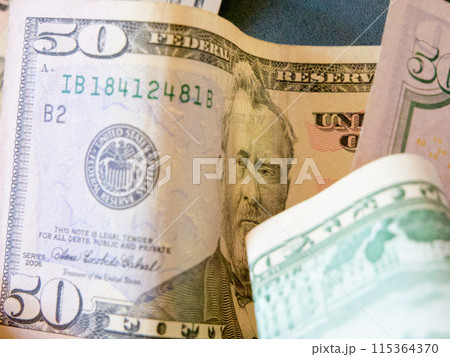 Banknote Texture. The intricate design of a $50 bill, highlighting its usage. Banknote Texture. The intricate design of a $50 bill, highlighting its usage. 115364370