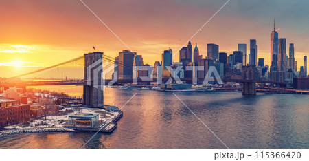 Brooklyn bridge and Manhattan at sunset 115366420