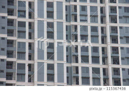 Big tall building background with windows and glass. Big tall building background with windows and glass. 115367436