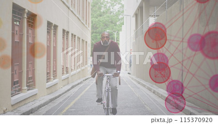 Image of networks with digital icons over african american man riding bike in city Image of networks with digital icons over african american man riding bike in city 115370920