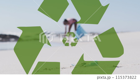 Image of recycling symbol over african american woman collecting waste on beach Image of recycling symbol over african american woman collecting waste on beach 115373822