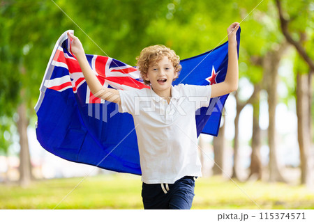 Child running with New Zealand flag. Kiwi fan 115374571