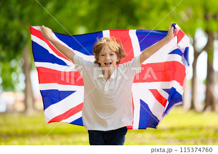 Child running with UK flag. Britain supporter 115374760