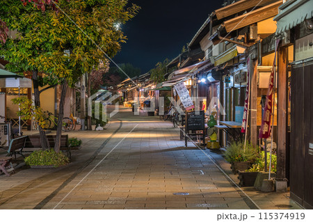 Matsumoto Nagano, Japan - November 2, 2019 : night city skyline at Nawate street the famous walking street in Matsumoto Matsumoto Nagano, Japan - November 2, 2019 : night city skyline at Nawate street the famous walking street in Matsumoto 115374919