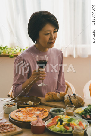 a forty-something woman a forty-something woman 115374974