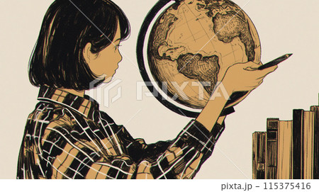 地球儀を持って海外旅行計画中の若い女性