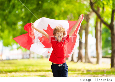 Child with Canadian flag. Happy Canada day Child with Canadian flag. Happy Canada day 115376183