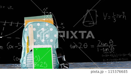 Image of mathematical equations floating over backpack with notebooks on black background 115376685