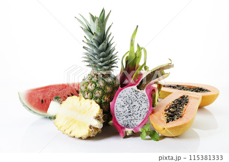 Creative layout made of fruits. Watermelon, pineapple, dragon fruit and papaya on white background. 115381333