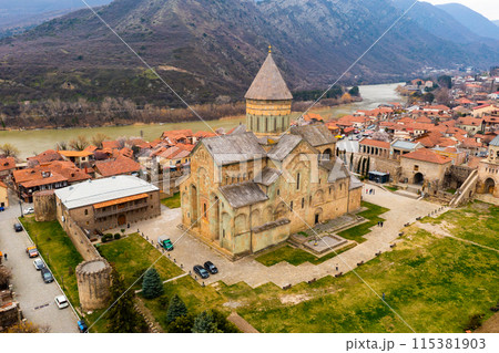 Aerial view of Georgian city of Mtskheta overlooking Svetitskhoveli Cathedral Aerial view of Georgian city of Mtskheta overlooking Svetitskhoveli Cathedral 115381903