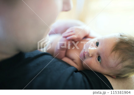 Father holding his newborn baby. Unconditional paternal love, Father's Day concept. Father holding his newborn baby. Unconditional paternal love, Father's Day concept. 115381904