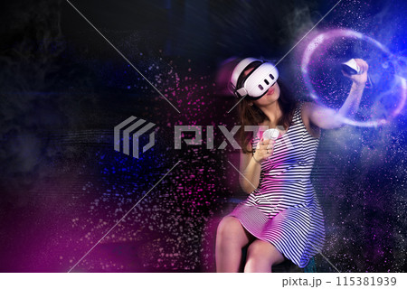 Young woman interacting with futuristic virtual reality environment 115381939