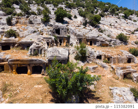 Ruins of rock necropolis in ancient city of Limyra, Turkey 115382091