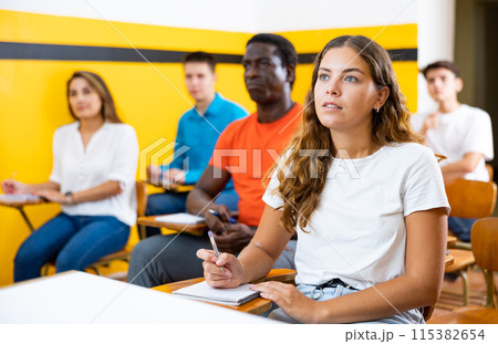 Young woman in school for taxi drivers Young woman in school for taxi drivers 115382654