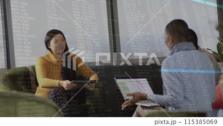 Image of financial data processing over diverse businesspeople working in office Image of financial data processing over diverse businesspeople working in office 115385069