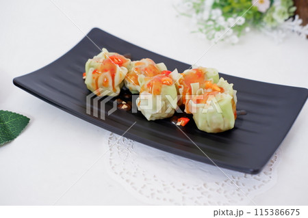 delicious fresh dim sum as a background delicious fresh dim sum as a background 115386675