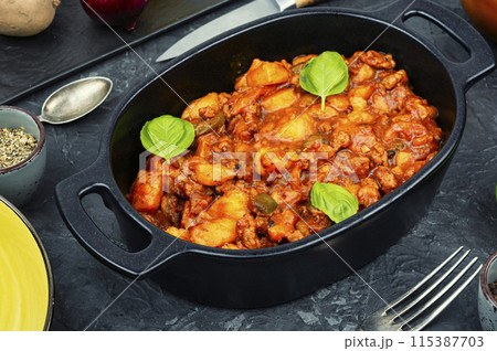 Roast potatoes and ground turkey. 115387703