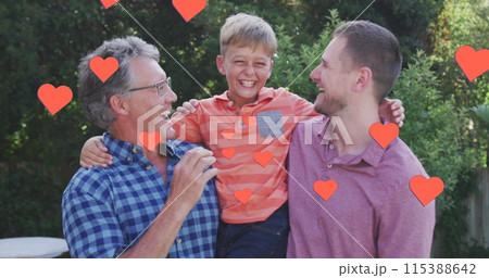 Image of hearts over happy caucasian three generation men hugging in garden 115388642
