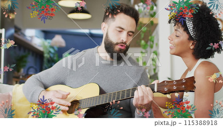 Image of flowers over happy diverse couple playing guitar together Image of flowers over happy diverse couple playing guitar together 115388918