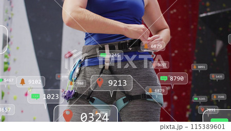Image of media icons over caucasian woman on climbing wall 115389601