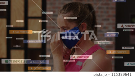 Image of media icons over caucasian woman wearing face mask 115389641