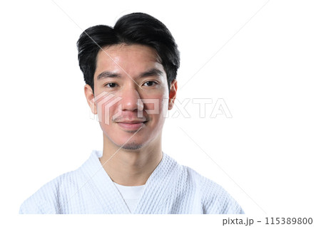 Handsome man after CO2 laser treatment on white background. Aesthetic face treatment concept 115389800