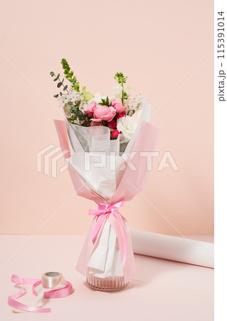 a bundle of bright pink flowers 115391014