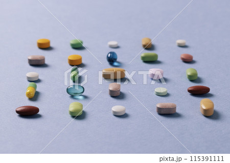 colorful pills arranged in a square shape colorful pills arranged in a square shape 115391111