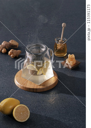a hot steaming glass teapot a hot steaming glass teapot 115391173