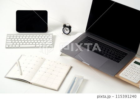 Black and white on the desk 115391240