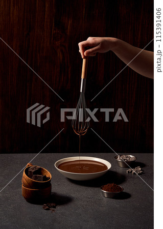 chocolate dripping from the whisk chocolate dripping from the whisk 115391406