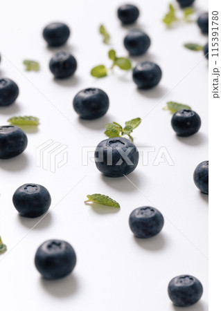 a regular arrangement of blueberries 115391780
