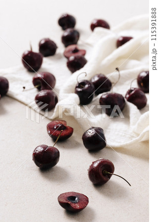 well cooked cherries scattered over the white ceiling 115391888