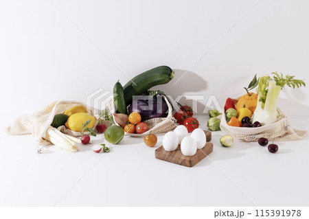 a variety of fresh salad vegetables and fruit ingredients 115391978