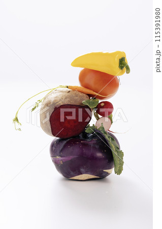 colorful vegetables piled on top of each other 115391980