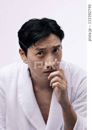 a middle aged man with a nose on his face 115392740