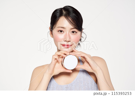 Asian Woman Poses With Cushion Facts With Both Hands 115393253
