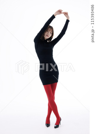 Korean Woman Poses in Black Dress and Red Leggings 115393486