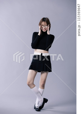 A 20s Korean Woman Wearing Geek Look and Glasses 115393647