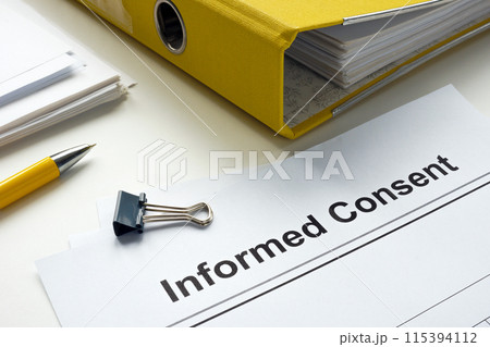 Informed consent documents and yellow folder. Informed consent documents and yellow folder. 115394112