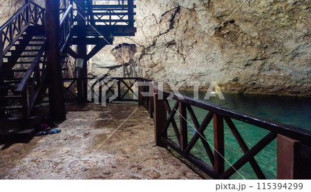 amazing natural pool of clear waters of Cenote Santa Barbara, in Homun, Mexico amazing natural pool of clear waters of Cenote Santa Barbara, in Homun, Mexico 115394299
