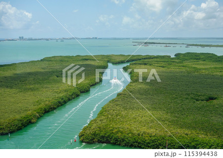 aerial panoramic of sea channels in mangrove area of Cancun, Mexico aerial panoramic of sea channels in mangrove area of Cancun, Mexico 115394438