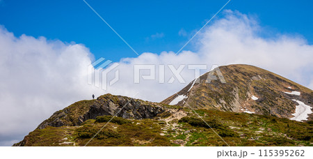 Landscape with Mount Hoverla hanging peak of the Ukrainian Carpathians against the background of the sky and clouds Landscape with Mount Hoverla hanging peak of the Ukrainian Carpathians against the background of the sky and clouds 115395262