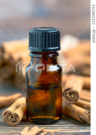 Bottle of cinnamon essential oil. 115396153
