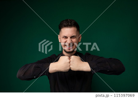 Man Making Fist Gesture With Hands Man Making Fist Gesture With Hands 115397069