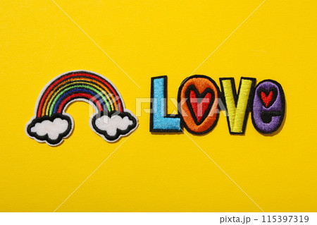 LGBT parade concept, free love symbol on yellow background. 115397319
