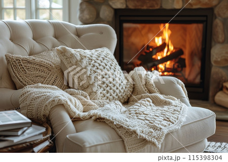 Cozy Armchair By The Fireplace On A Snowy Day 115398304